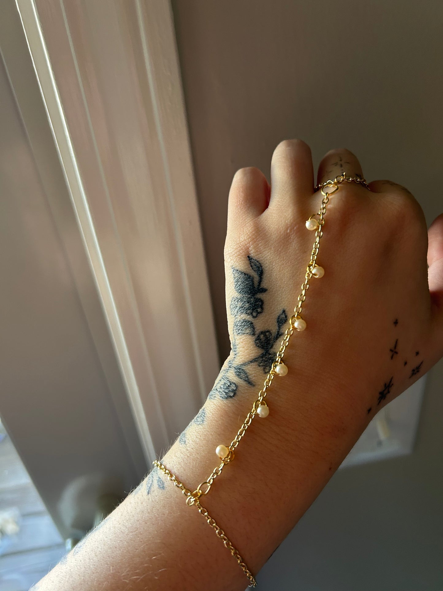Gold Pearls Hand Chain