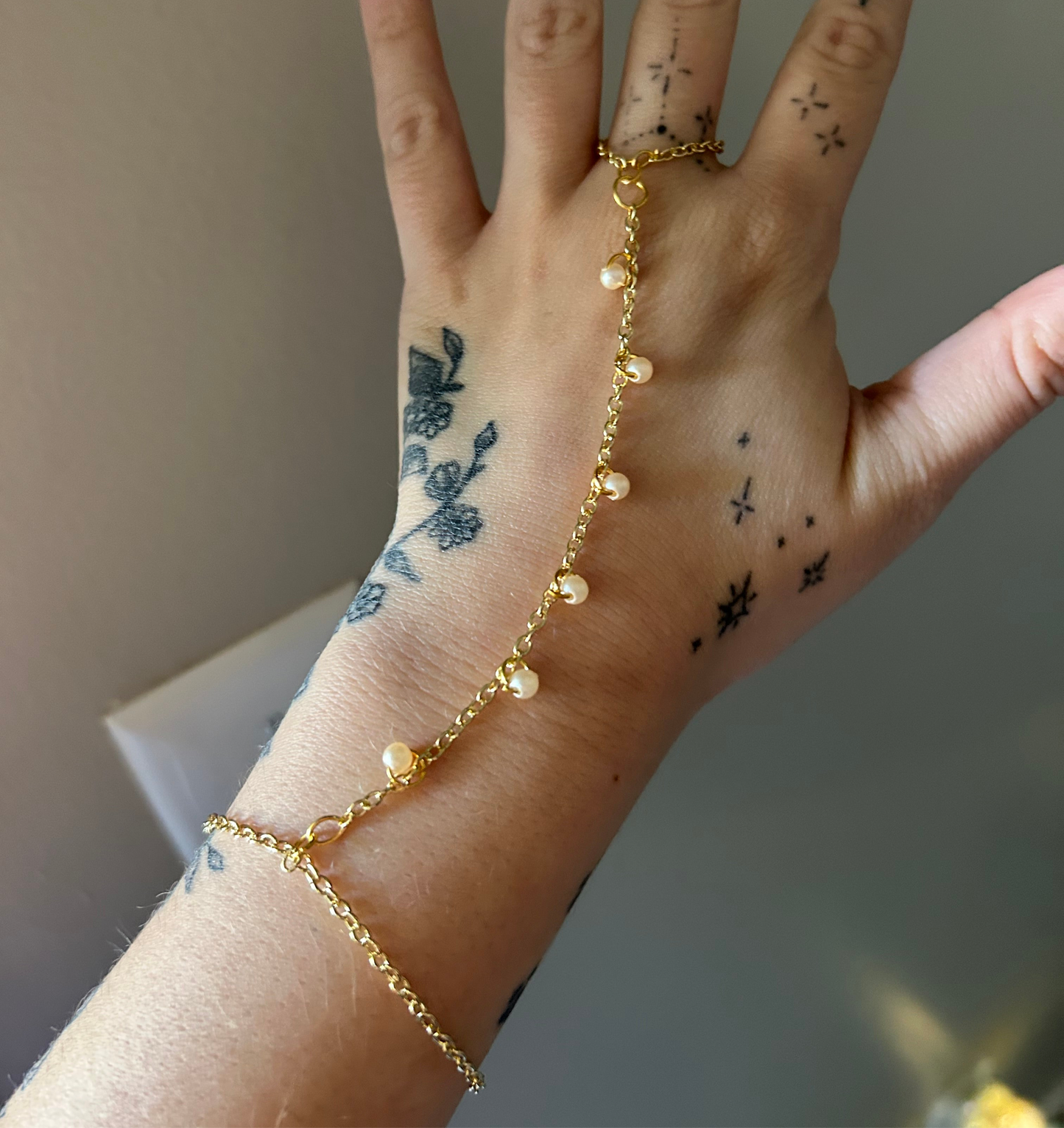 Gold Pearls Hand Chain
